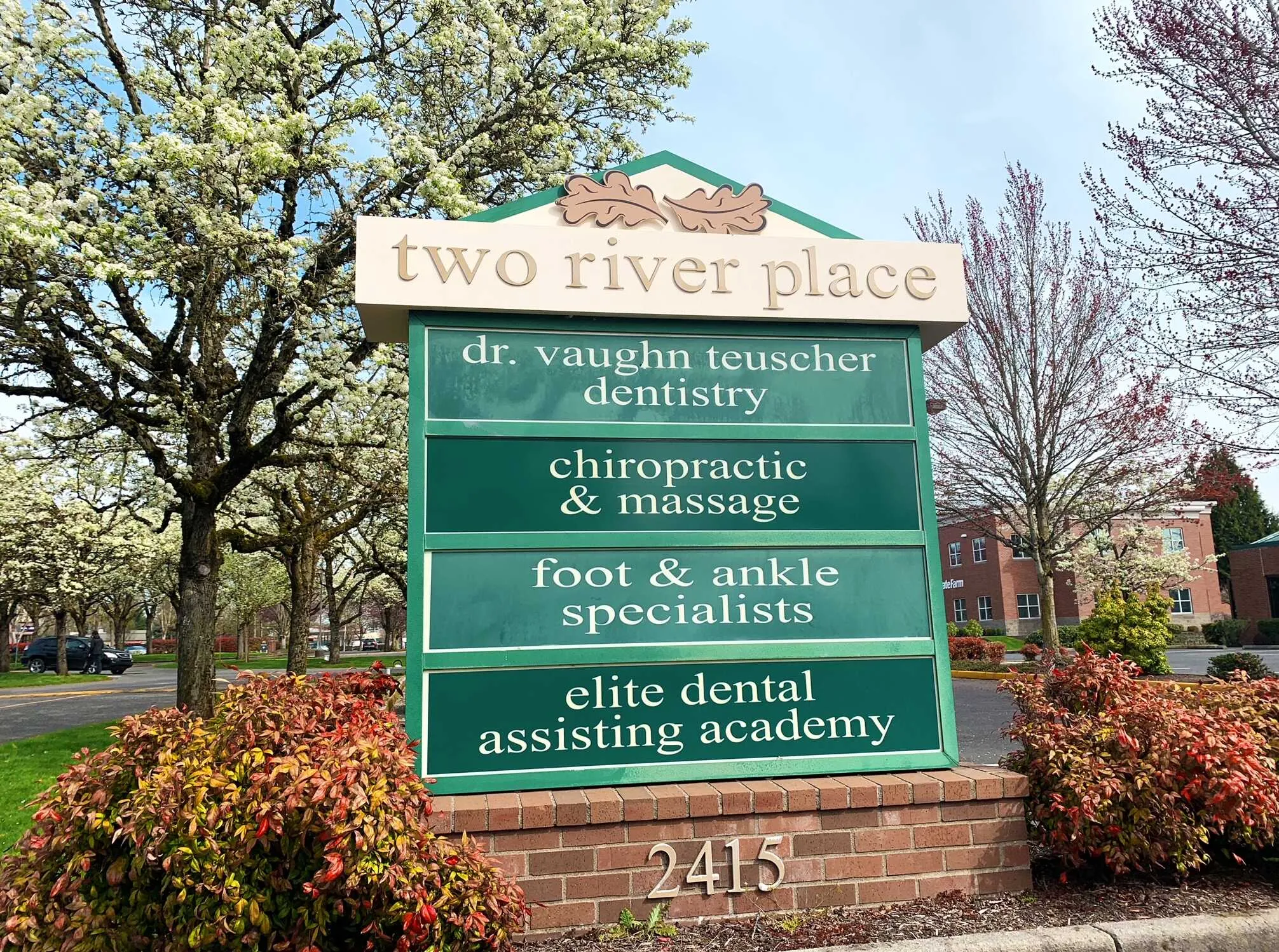 Two Rivers Dentistry monument sign in front of the office